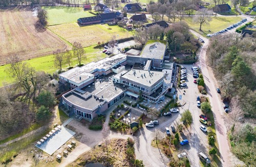 Zeegse Apartment | Modern Comfort Meets Nature: Pool, Sauna, and Trails Right Outside Your Room