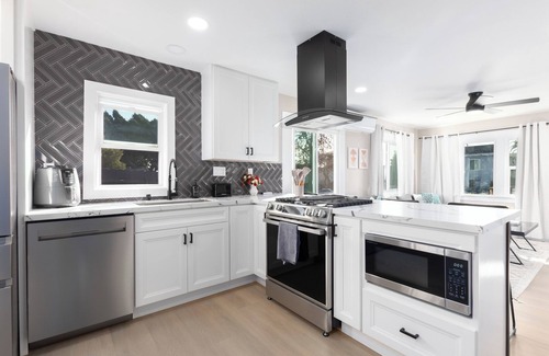 Corridor House | Modern Home Near Downtown with Firepit and BBQ