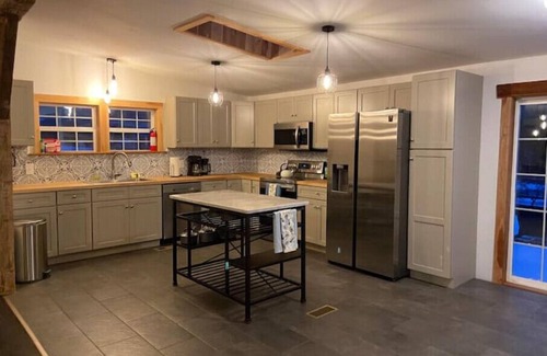 Charlotteville House | Modern home overlooking private lake and mountains. Pet Friendly!