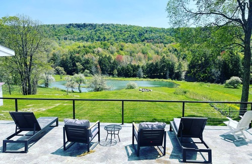 Charlotteville House | Modern home overlooking private lake and mountains. Pet Friendly!