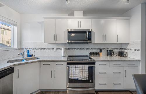 Southwest Calgary House | Modern House with Private Backyard & Fireplace