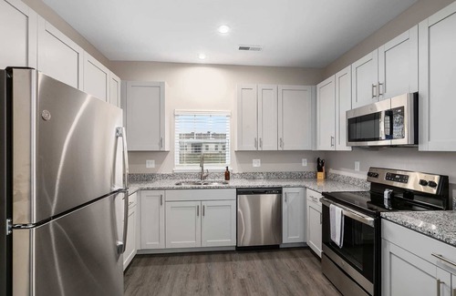 Grandville Condo | Modern New Build 2BR 2BA Condo w Garage and Patio