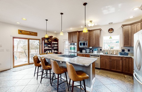 Livingston House | Nature lover’s lakefront home with a beach, dock, fire ring, & more