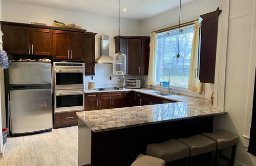 Adair Park House | NeighborGOOD, comfy fully furnished & located convenient between Airport & Dwtn