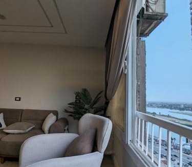 Cairo Apartment | Nile Retreat The perfect Nile and Pyramids View in Maadi شقة فندقية علي النيل مباشرة