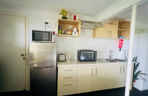 Coffs Harbour Apartment | No.2 Entire Beach Side apartment Ocean views too - With King Bed & Kitchenette