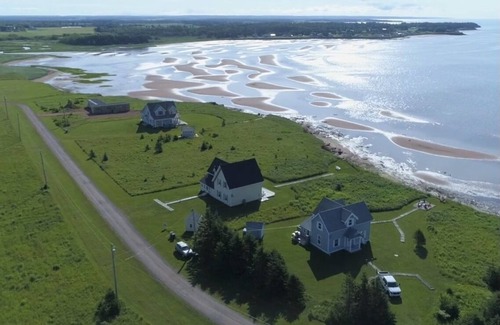 Cape Traverse Cottage | Oceanfront cottage. Steps to the beach, pet & family friendly. .