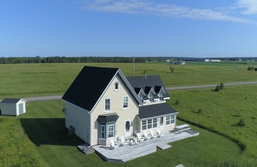 Cape Traverse Cottage | Oceanfront cottage. Steps to the beach, pet & family friendly. .