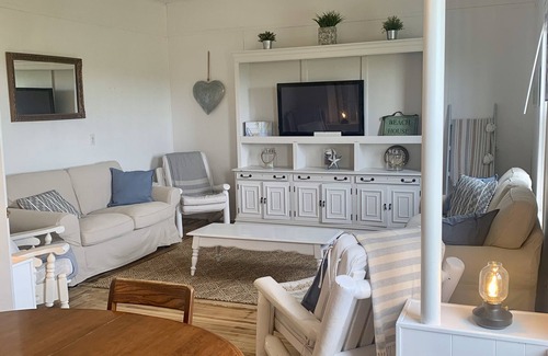 Cape Traverse Cottage | Oceanfront cottage. Steps to the beach, pet & family friendly. .