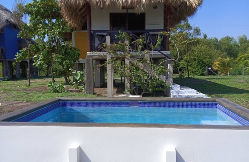 Leon Cottage | Oceanfront Studio Escape with Plunge Pool at Playa Tesoro