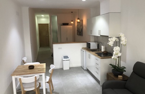 Ponta Delgada House | Oceanfront studio with private cobblestone patio and direct access to ocean pool