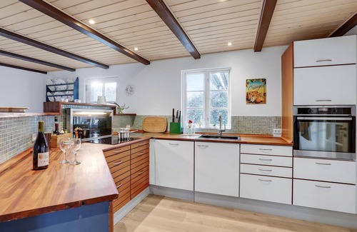 Maribo House | On the quiet island of Askø, this beautiful vacation home near the beach welcomes you.