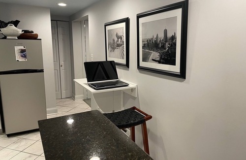 Mid-North District Apartment | One block from Lincoln Park and the zoo