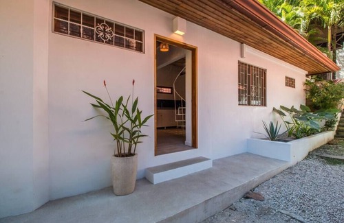 Playa Guiones House | Only steps to the surf and a short walk to yoga, this modern casita sleeps 6.