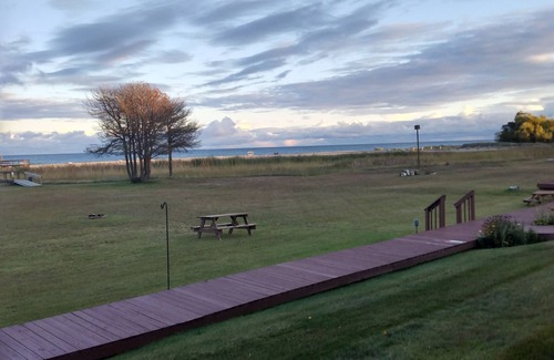 Au Sable Condo | Oscoda Condo on the shore of Lake Huron. Ausable Township 800 feet of Beach.