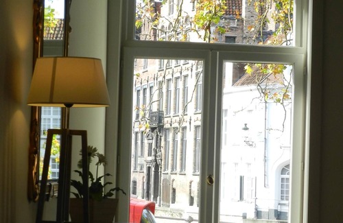 Historical Center Bruges Apartment | Our holiday apartment is located on the Sint-Annarei and offers a view of the mo