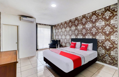 Ngamprah Hotel | OYO 90873 Orchid Guesthouse