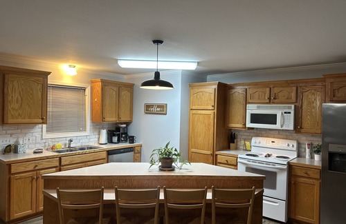 Farmerville House | Peaceful lake front home with wrap around porch and relaxing views!