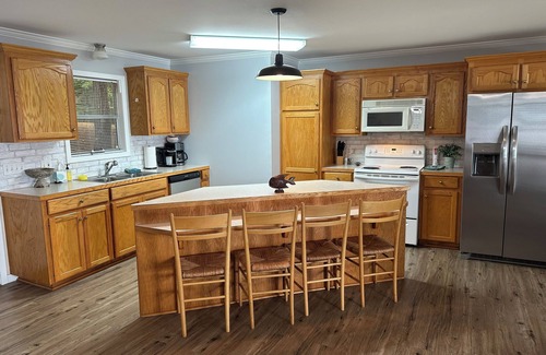 Farmerville House | Peaceful lake front home with wrap around porch and relaxing views!