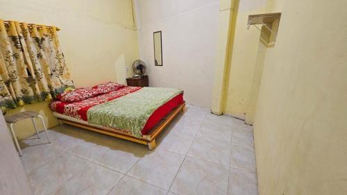 Padang House | Penginapan Bunga Sonsang Padang Syariah