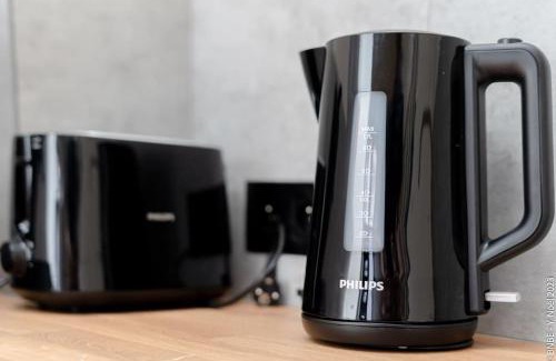 Leffe Apartment | Petite Dinant - Feet in water hands on the rock