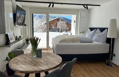 Faistenau Apartment | place2be - with infinity pool