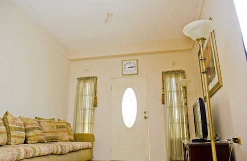 Piarco Apartment | Port of Spain Breezy Guest Apartment