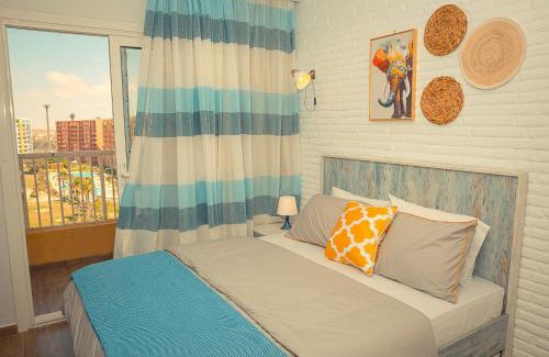 Marina El Alamein Apartment | Porto Golf Marina Pool View By Best of Bedz