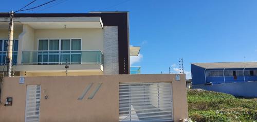 Foguete House | Principado Dunes Park Casa Temporada frente mar e pé na areia