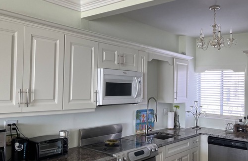 Discovery Bay Condo | Pristine white sand beachfront condo in Freeport, Grand Bahama. New Owners.