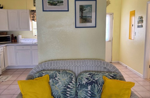 West End House | Private 2-b beachfront cottage w/hammocks, screened-in veranda, sunsets & more!