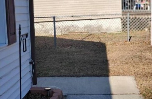 Richwood House | PRIVATE ENTRANCE AND PATIO WITH 60"TV