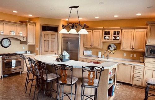 Ingalls House | Private lakefront home with 1,200 feet of sandy beach. A year-round retreat.