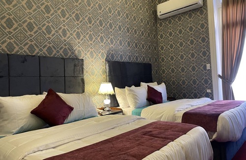 As-Sajil Bed & Breakfast | PRIVATE QUADRUPLE ROOM. TOWN VIEW