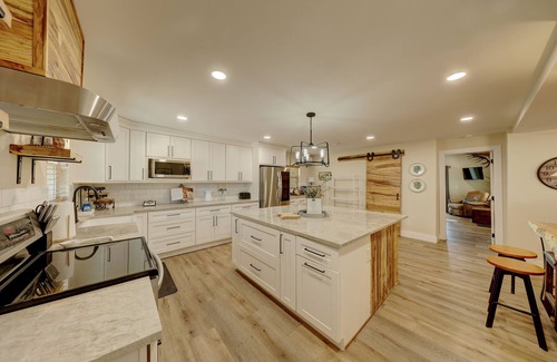 Hunt House | Private Riverfront, HOT TUB, Game room & 4 Patios overlooking the Guadalupe!