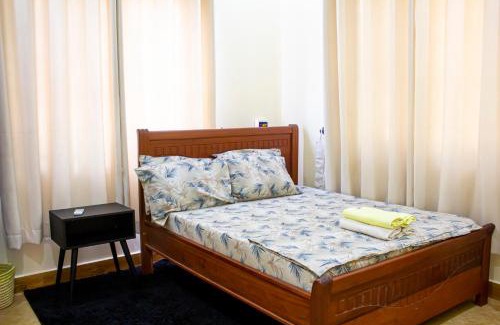 Mbezi Beach House | Private Room in 2-Bedroom Apartment with Shared Spaces