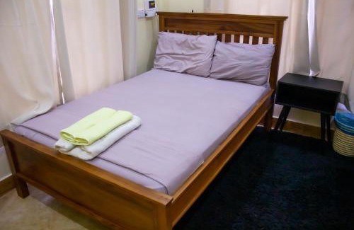 Mbezi Beach House | Private Room in 2-Bedroom Apartment with Shared Spaces