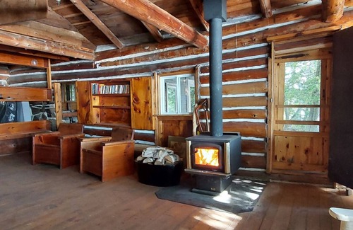 Limerick Cottage | Private water (boat) access, rustic offgrid log cabin on class five lake.