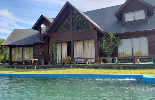 Molco Ski Chalet | Pucon Chile, Los Arrayanes Park & Events Room. Large Chalet for 15 countries