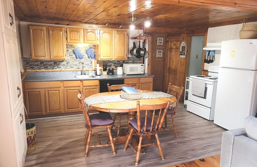 The Bluff Cottage | Quaint beach cottage only 6 minute walk to famous Parlee Beach