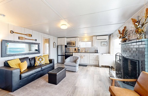 Netarts House | Quaint oceanfront hideaway with open layout, fireplace, central AC, & gas grill