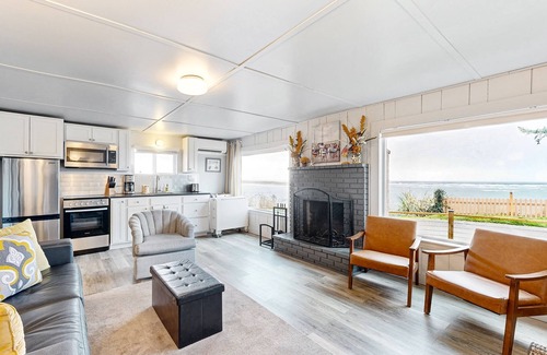 Netarts House | Quaint oceanfront hideaway with open layout, fireplace, central AC, & gas grill