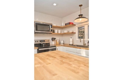 Johnsonburg House | Quaint, Off Grid Lakefront Cabin on 200 private Acres