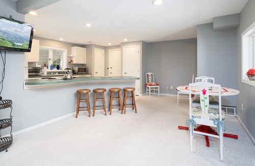 Webster House | Quaint Urban Cottage/Guest House on 3 acre wooded lot over looking a pond.