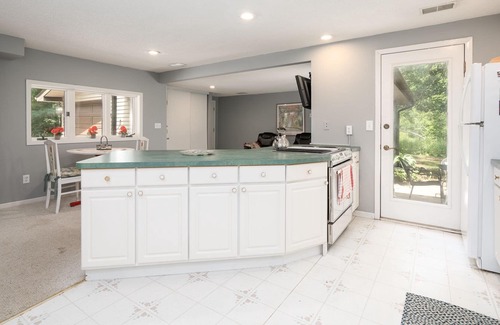 Webster House | Quaint Urban Cottage/Guest House on 3 acre wooded lot over looking a pond.