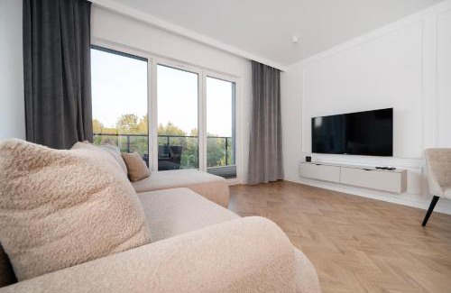 gmina Parzeczew Apartment | Rąbieńska Urban Elegance Apartment by BookingHost