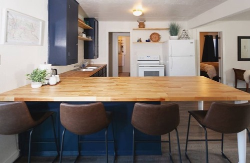 Gold Hill Cottage | R&R on the Rogue River! This 2 BR cottage in Gold Hill features a private hot tub with stunning scenic views. Enjoy a spacious, private setting perfect for relaxation, adventure, or remote work