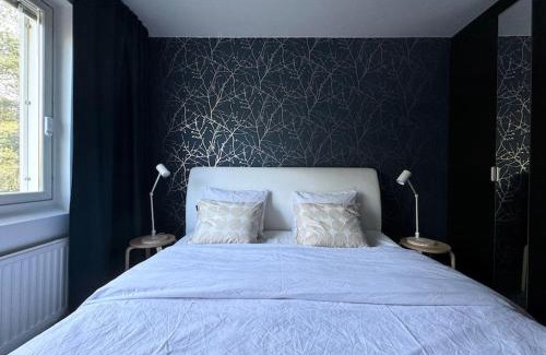 Oulu Apartment | Rauhallinen ja tilava ylimmän kerroksen neliö