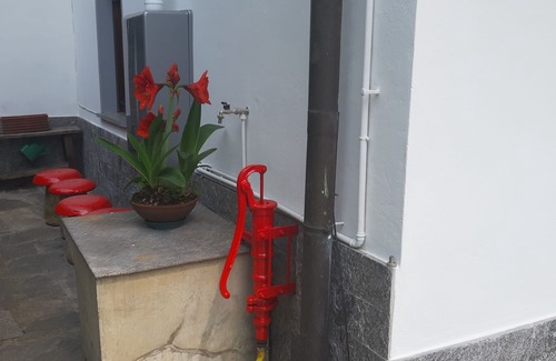 Arizzano House | red fountain house