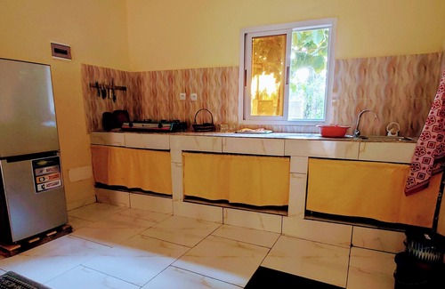 Comoe House | Red Villa